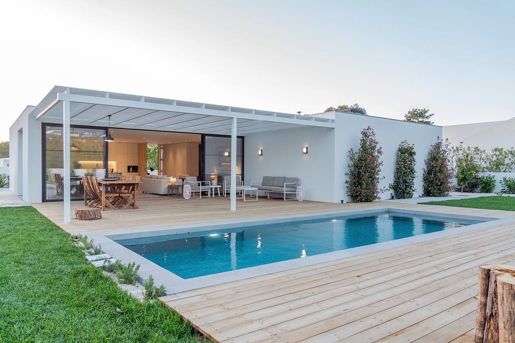 modern villa with pool and insulated patio roof